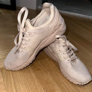 Women’s size 7 ASICS sneakers bought in Paris.